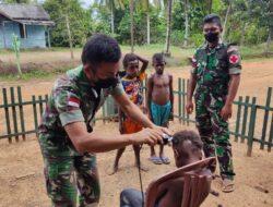 Peduli Kerapihan, Prajurit Satgas Yonif 123/Rajawali Buka Pangkas Rambut Gratis