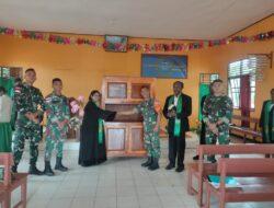 Jaga Toleransi Beragama, Satgas Pamtas Yonif 123/RW Serahkan Bantuan Lemari untuk Gereja perbatasan