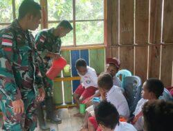 Susu Gratis Untuk Anak-Anak Perbatasan Papua Dari Satgas Pamtas Yonif 126/Kala Cakti