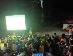 Satgas TMMD Mimika Hibur Warga Dengan Acara Nonton Bareng