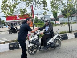Polda Kaltara dan SCI Bagi Bendera Jelang HUT RI Ke-80